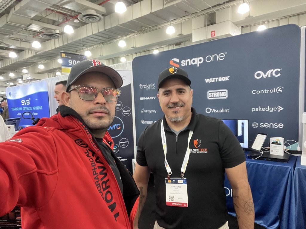 Juan at an industry trade show booth